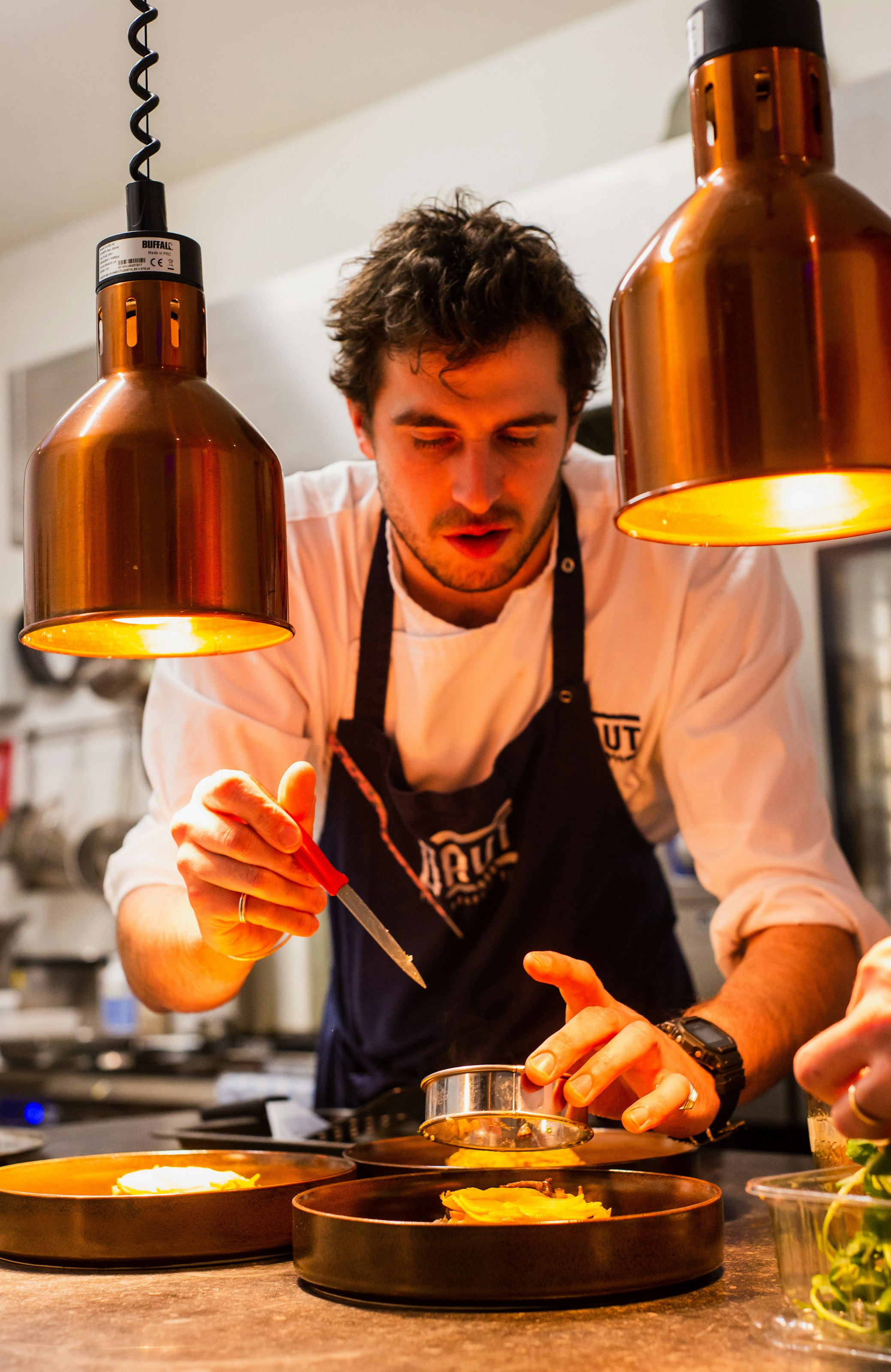 Chef preparing food in professional kitchen